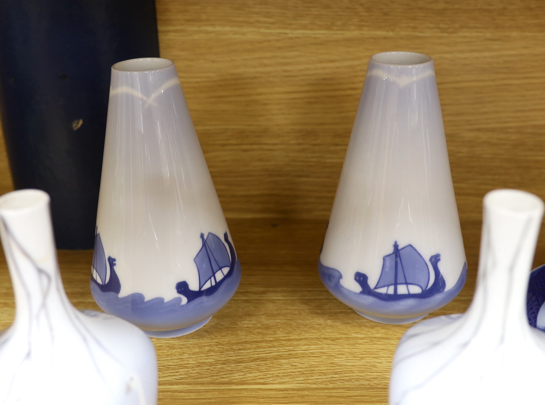 Two pairs of Royal Copenhagen vases, three others and three plates, with decorations including ships, geese, snail, etc (9), 18cm high